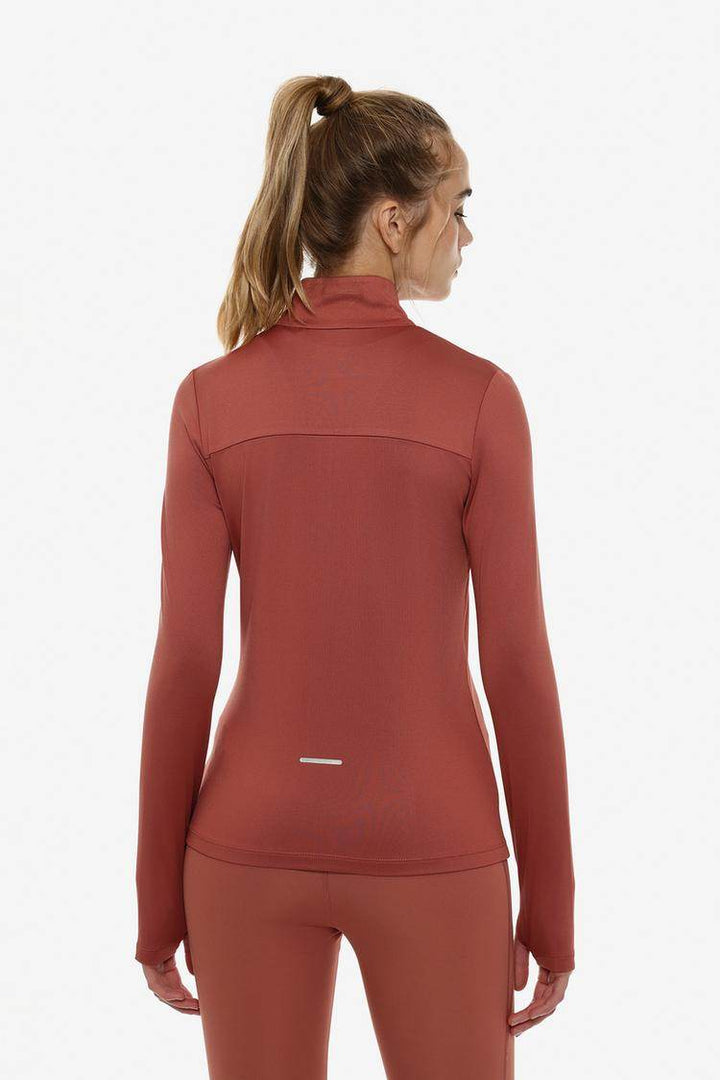 Back view of the women's red sports jacket

