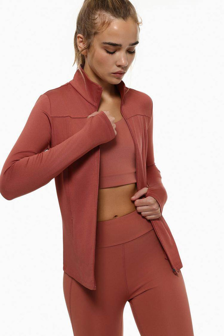 Model showcasing red sports jacket front view

