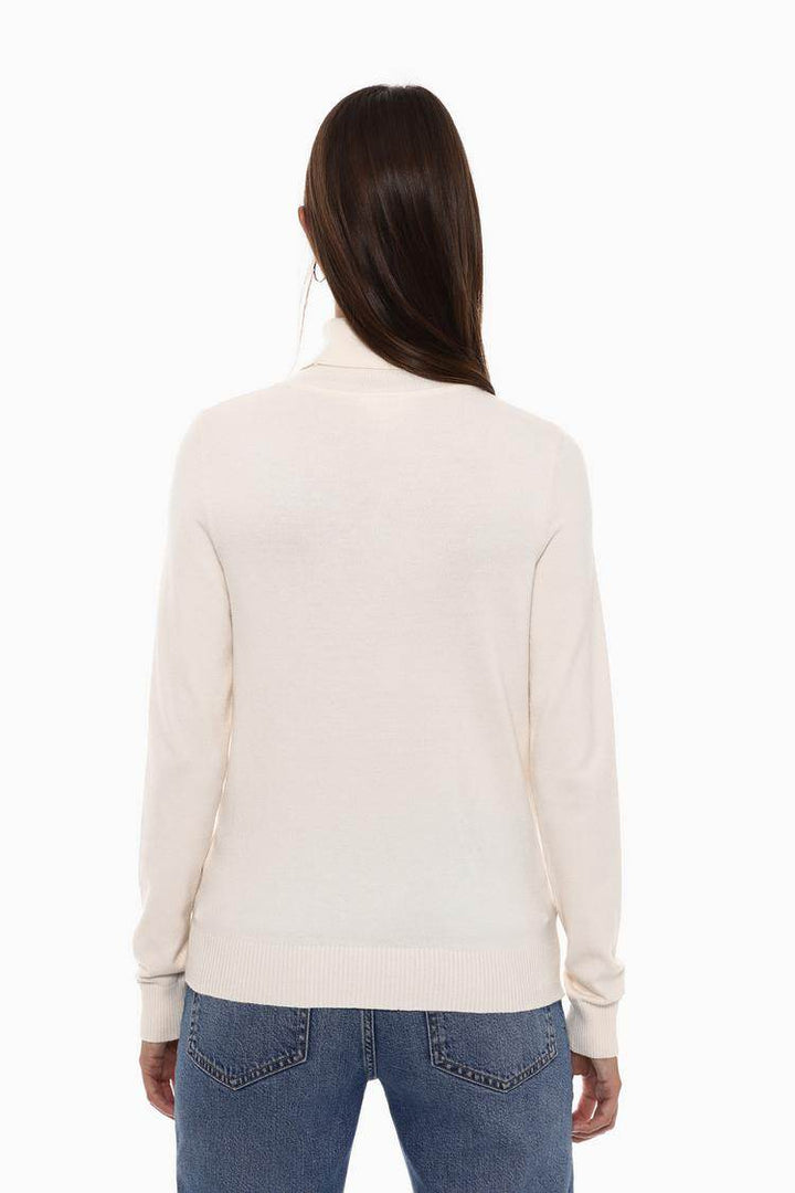 Back view of the women's white basic turtleneck sweater

