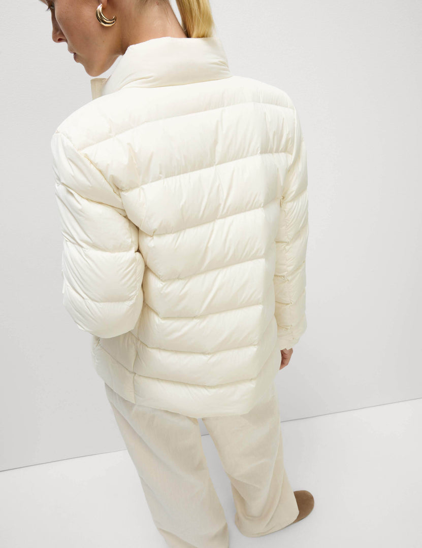 Back view of the women's white puffer jacket

