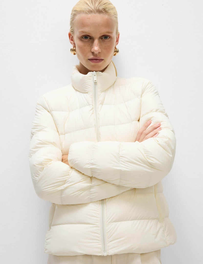 Front view of the women's white puffer jacket

