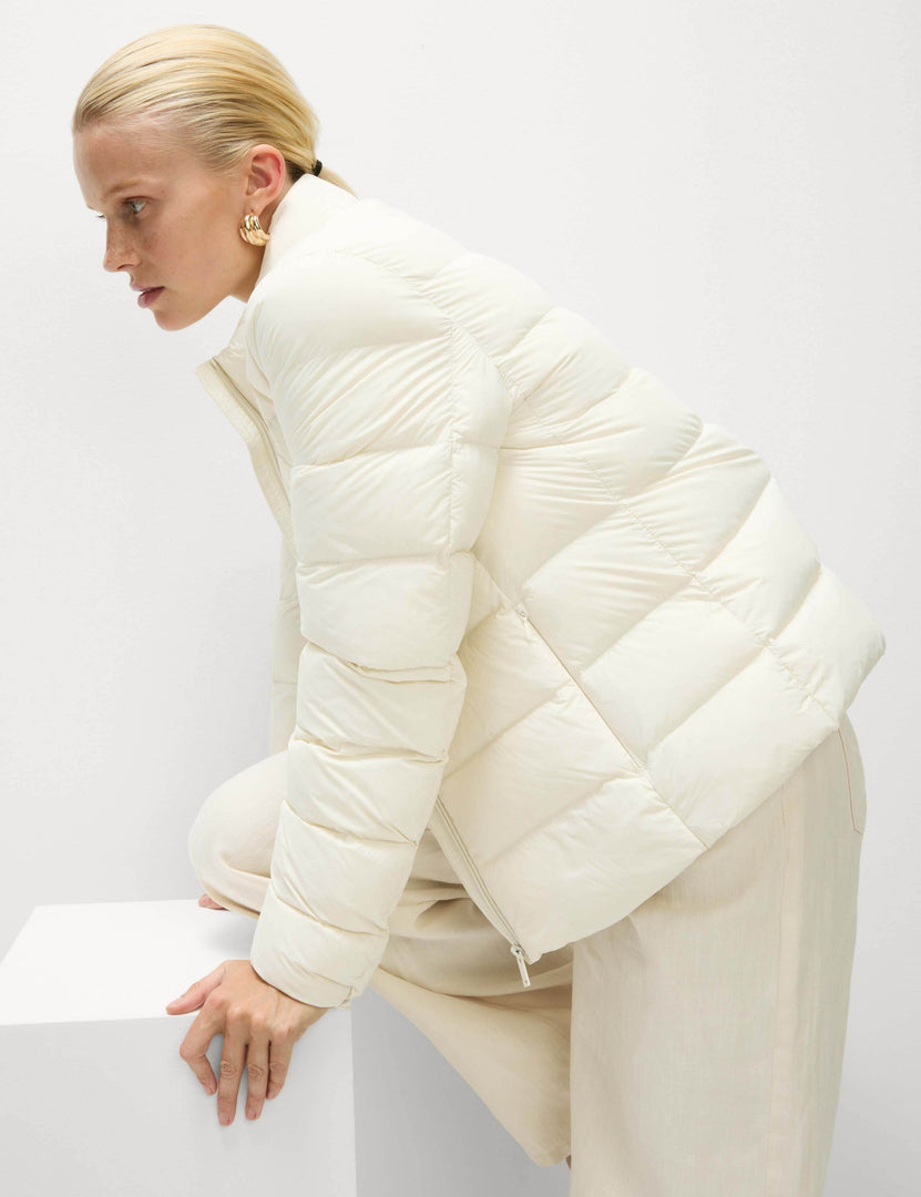 Right side view of the women's white puffer jacket

